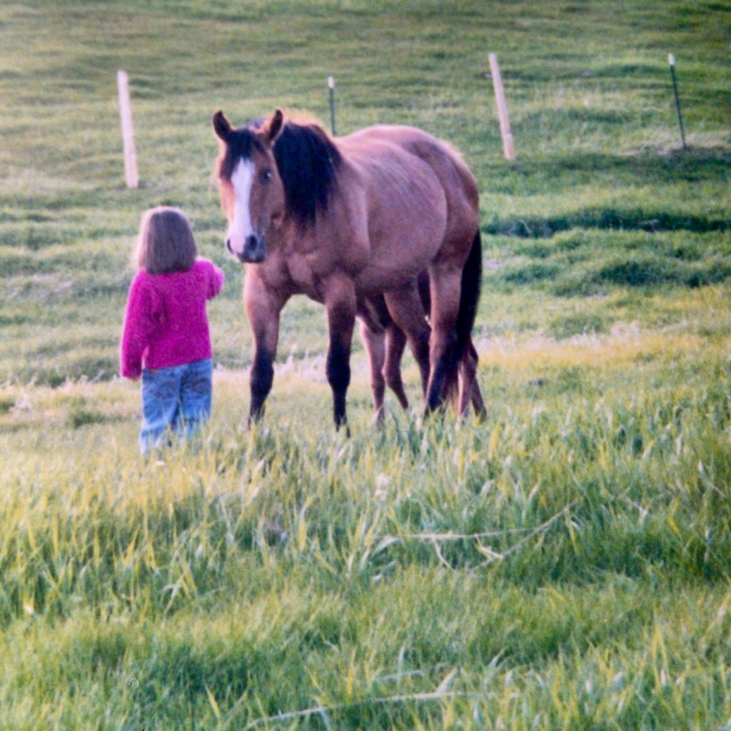 Kassie, age 4, and her horse Lena who is now 26. (Courtesy of Kassie Guglielmino)